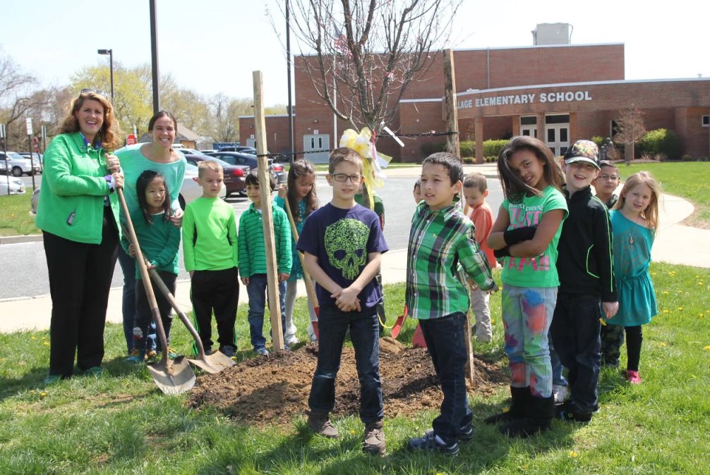 Freeholder Serena DiMaso celebrates Arbor Day with students of Village Elementary School on April 25, 2014 in Holmdel, NJ.